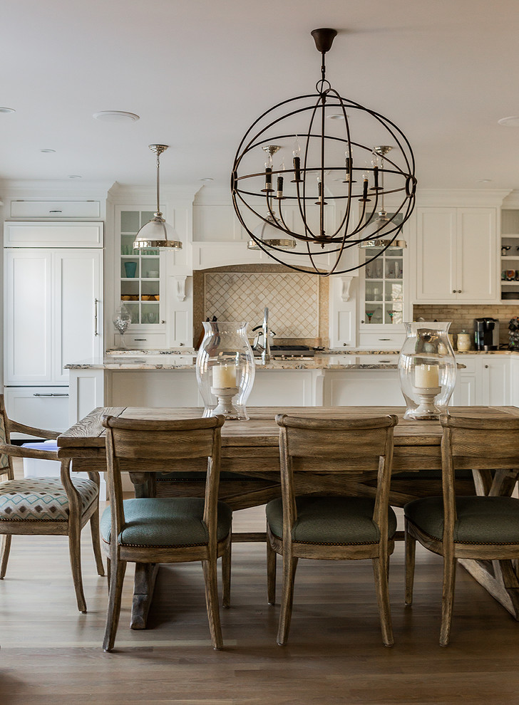 Large elegant dark wood floor kitchen/dining room combo photo in Boston with white walls and no fireplace