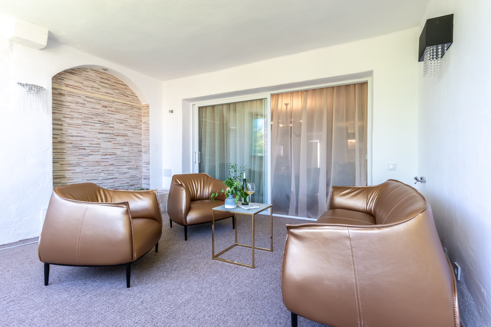 Ejemplo de terraza actual grande en anexo de casas