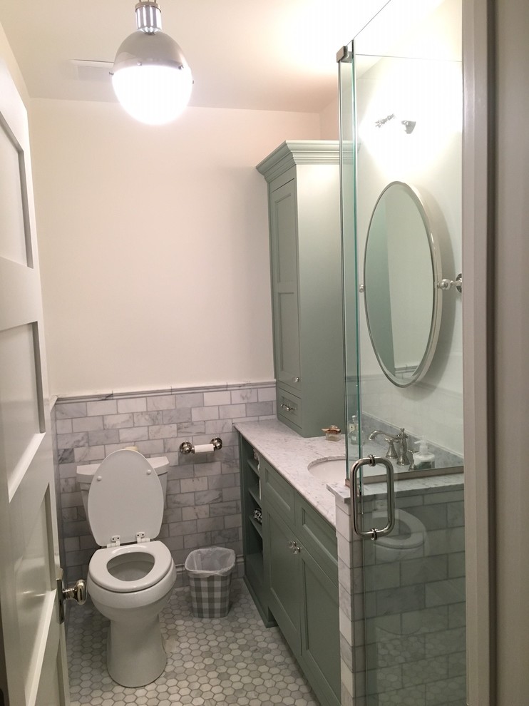 Mid-sized transitional 3/4 bathroom in Chicago with recessed-panel cabinets, green cabinets, gray tile, marble, white walls, marble floors, an undermount sink and marble benchtops.