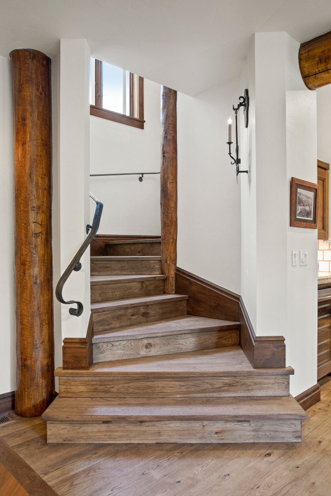 Mountain style wooden metal railing staircase photo