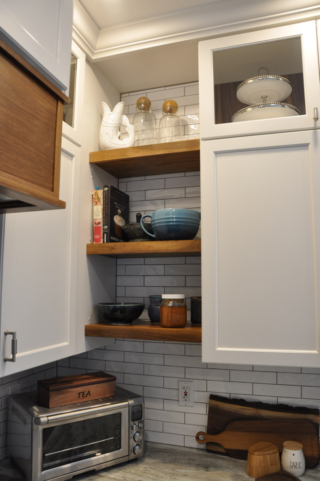 Example of a transitional home design design in Boston