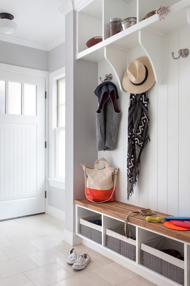 Inspiration for a traditional mudroom in Austin with grey walls, a single front door and a white front door.