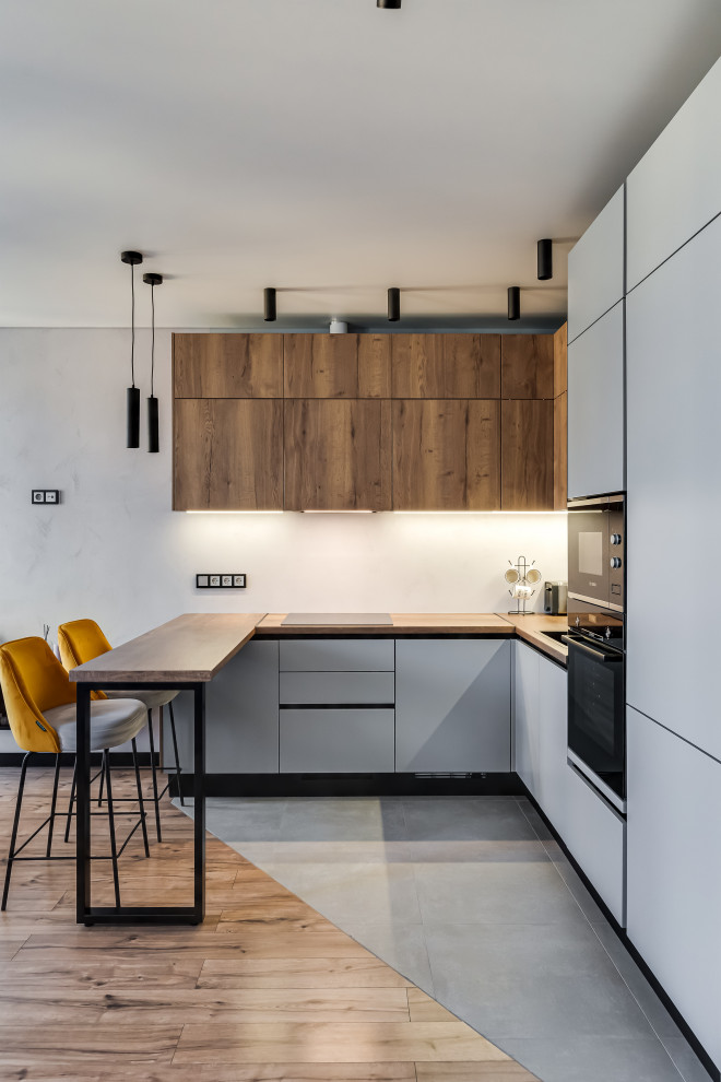 Угловая кухня совмещенная с гостиной