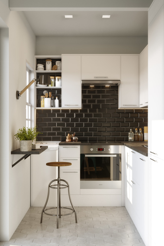 Small contemporary l-shaped eat-in kitchen in Paris with a single-bowl sink, laminate benchtops, black splashback, ceramic splashback, stainless steel appliances, ceramic floors, no island, grey floor and black benchtop.