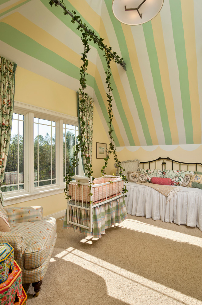 Design ideas for a large traditional nursery for girls in Boston with multi-coloured walls, carpet and beige floor.