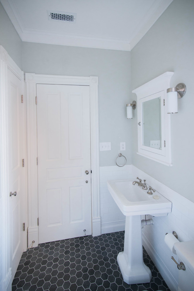 Example of a small transitional kids' gray tile and stone tile alcove bathtub design in DC Metro with a one-piece toilet, gray walls and a pedestal sink