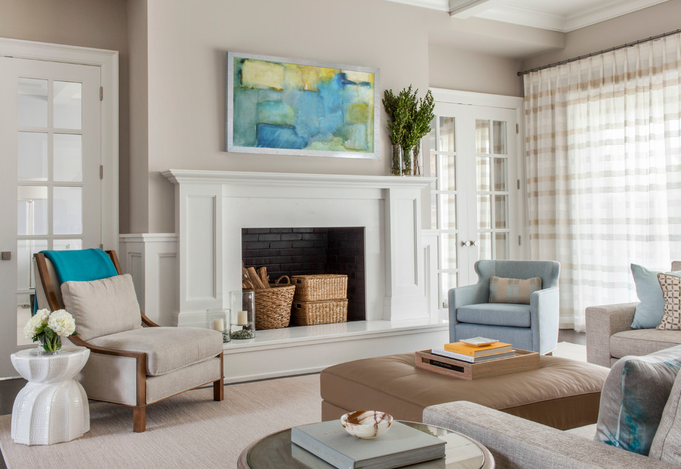 Design ideas for a transitional formal living room in New York with beige walls and a standard fireplace.