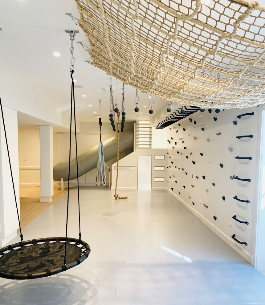 Minimalist perfection! - Inspiration for a mid-sized country gender-neutral light wood floor, gray floor, wood ceiling and wall paneling playroom remodel in New York with white walls