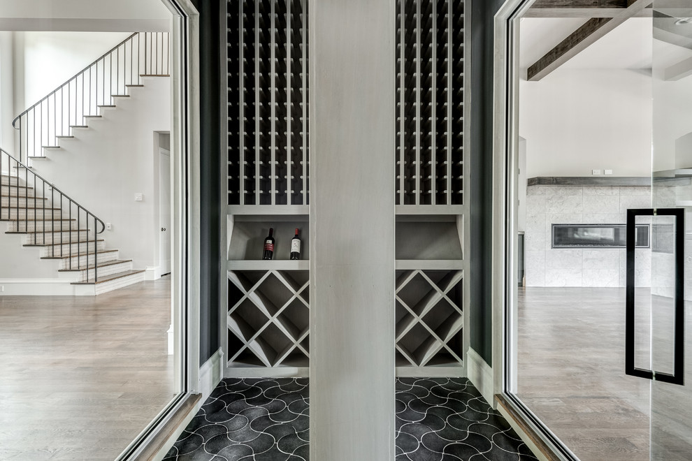Design ideas for a contemporary wine cellar in Dallas with ceramic floors, diamond bins and black floor.