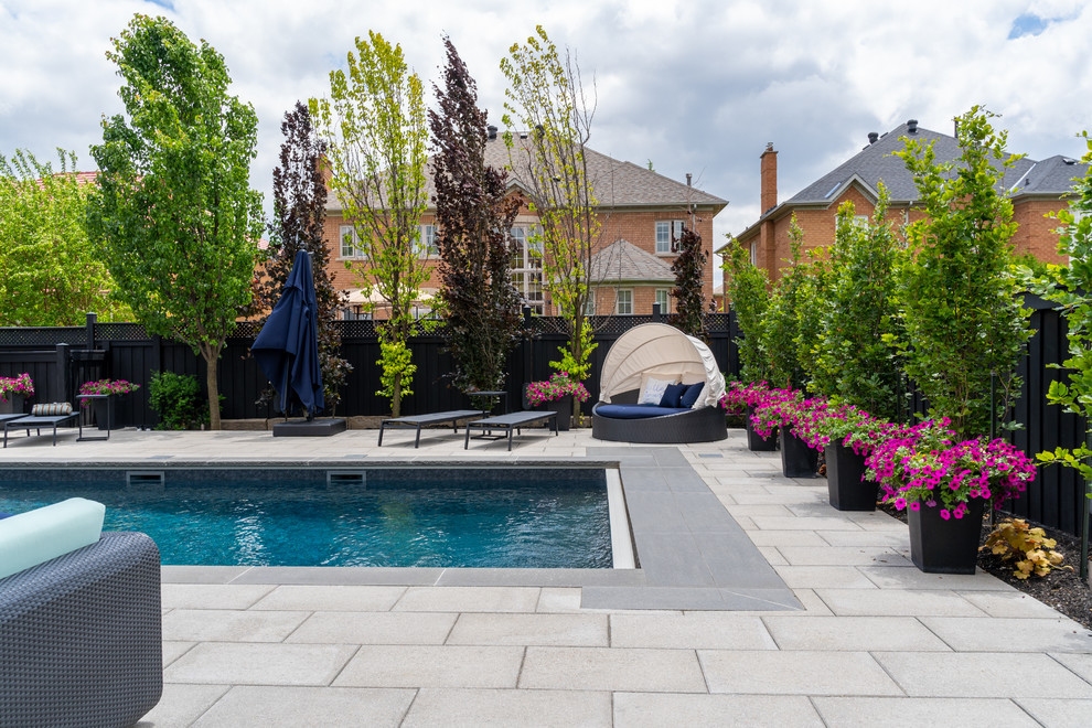 Inspiration for a contemporary backyard rectangular lap pool in Toronto.