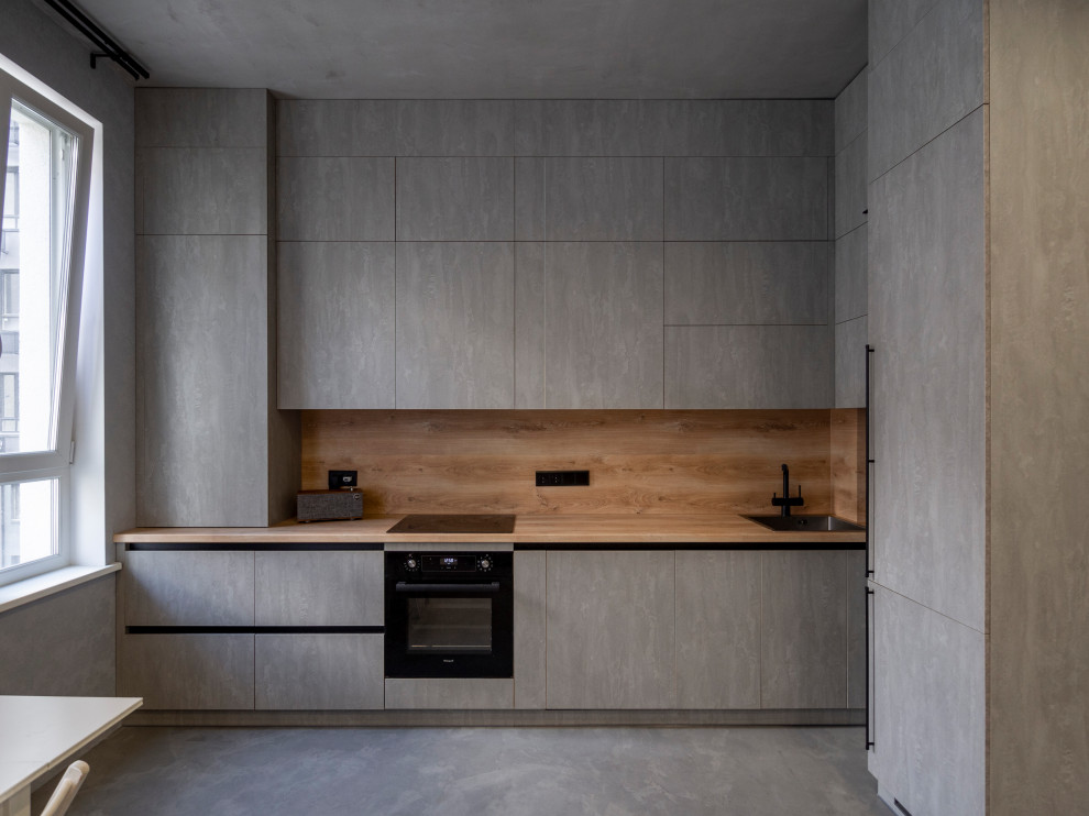 Элегантная минималистичная кухня в сером цвете