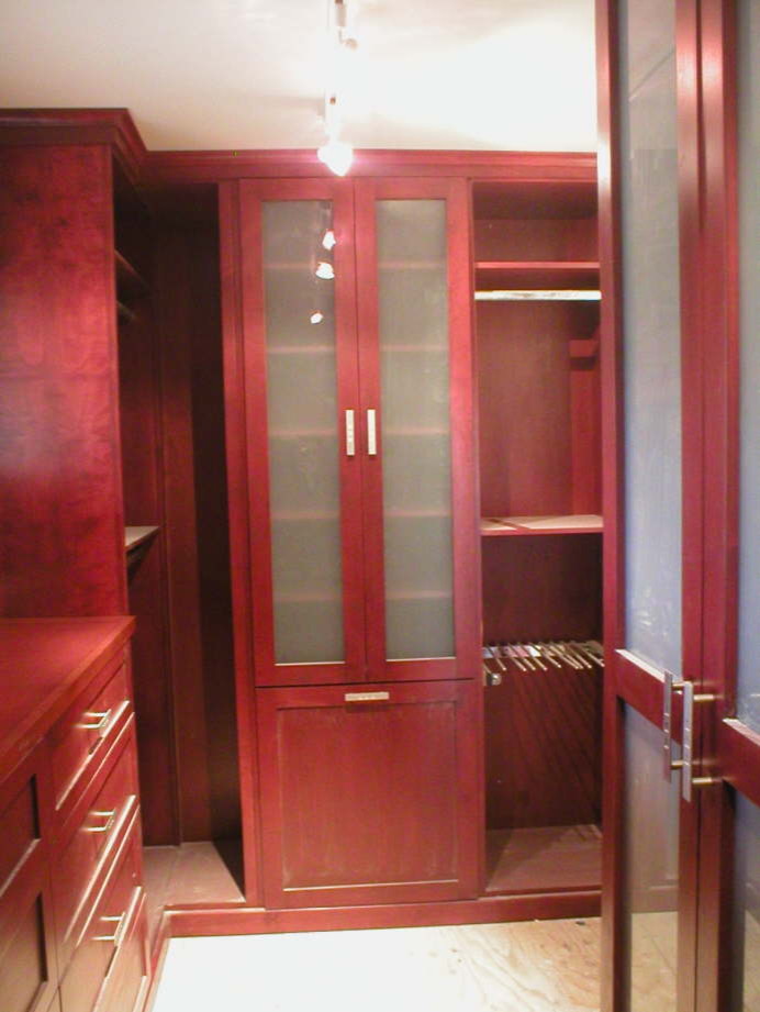 This is an example of a traditional storage and wardrobe in Orange County.