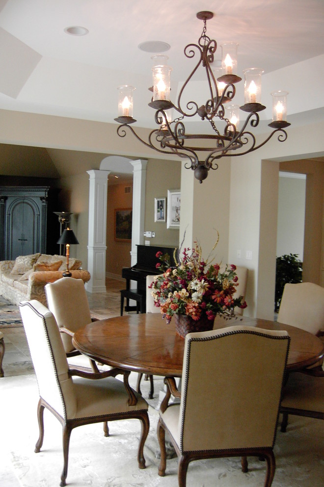 Mid-sized traditional open plan dining in Milwaukee with beige walls, carpet, no fireplace and white floor.
