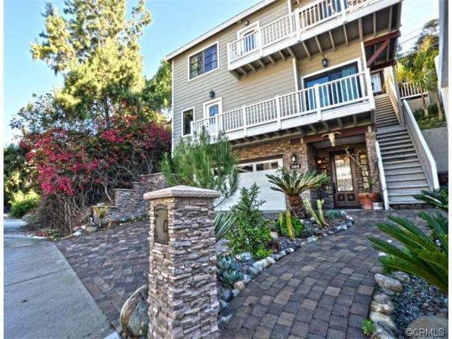 Inspiration for a transitional exterior home remodel in Orange County