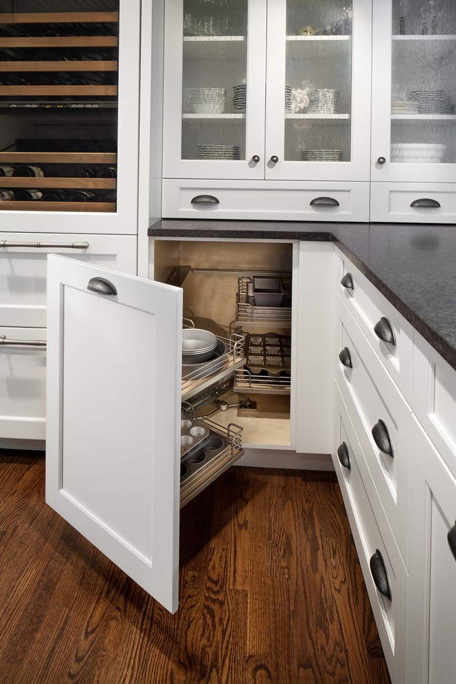 Example of a transitional u-shaped eat-in kitchen design in DC Metro with shaker cabinets, blue cabinets, marble countertops, yellow backsplash, ceramic backsplash and an island