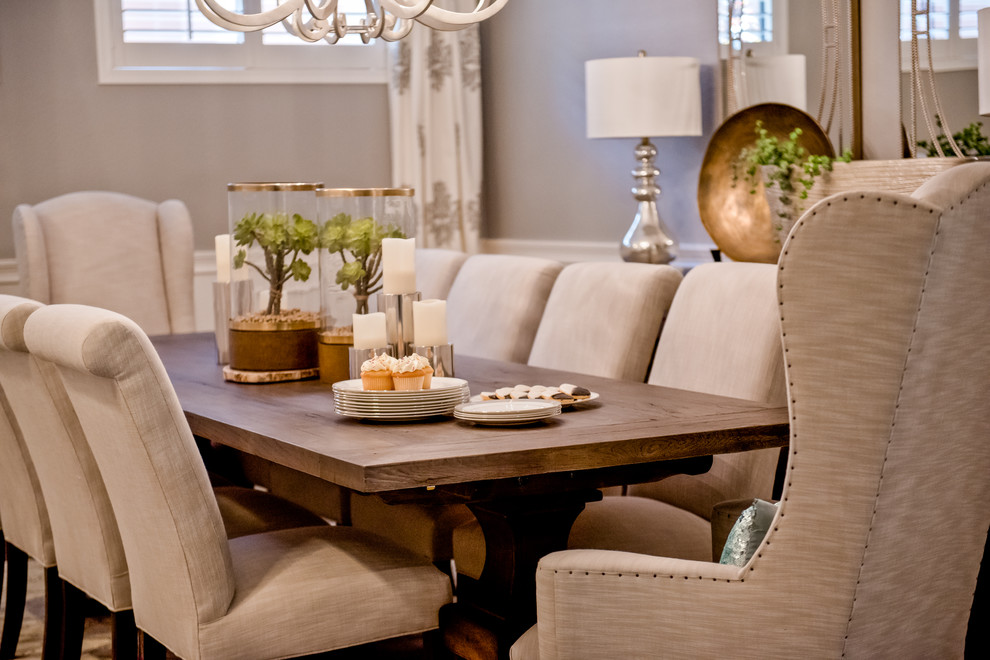 Large transitional dark wood floor enclosed dining room photo in Phoenix with gray walls and no fireplace