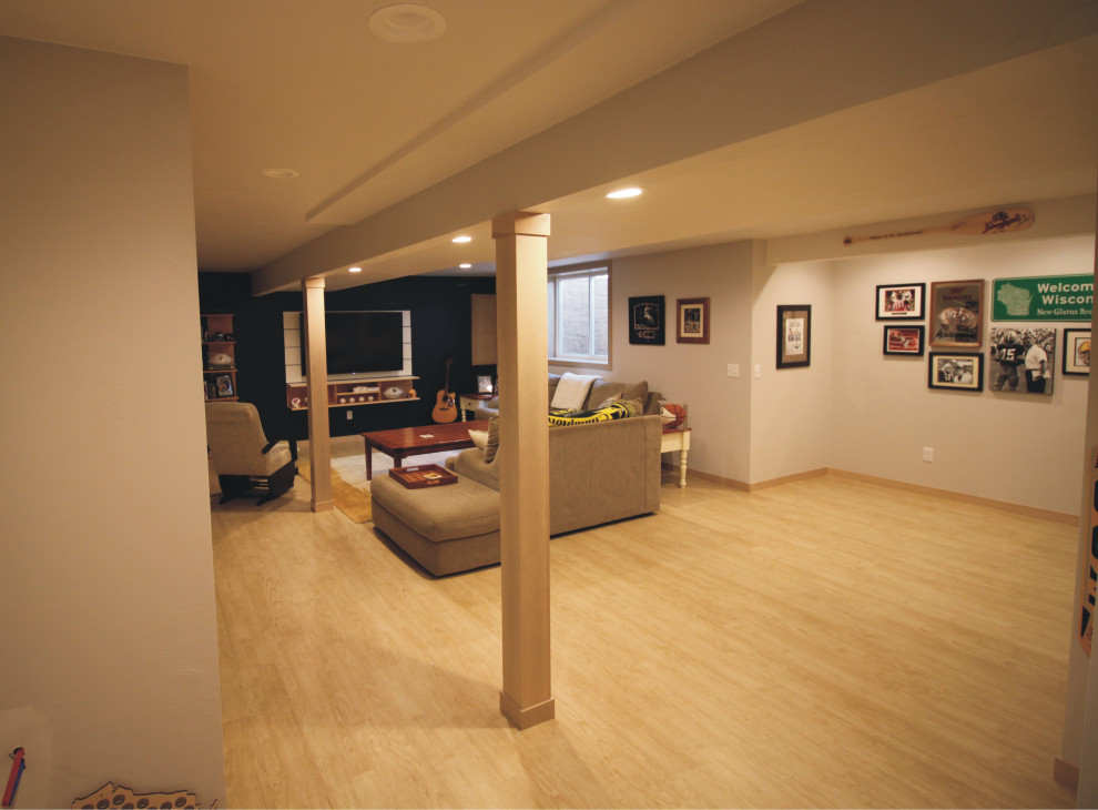 Design ideas for a medium sized contemporary fully buried basement in Other with a game room, laminate floors and yellow floors.
