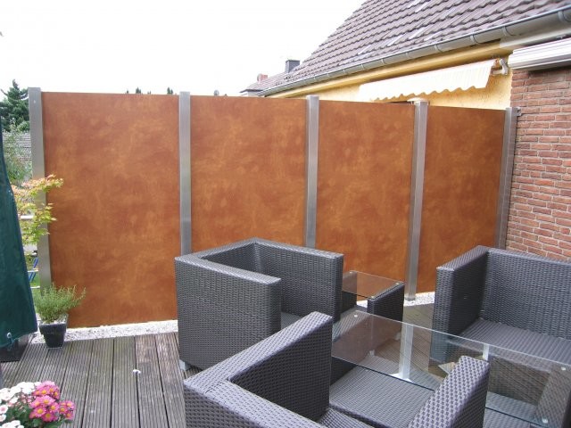Balkon Abtrennung in Edelstahl und Trespa deck