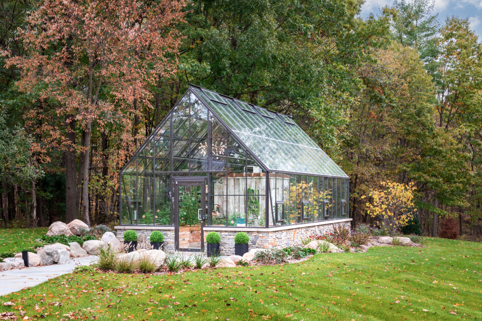This is an example of an eclectic sunroom in Detroit.
