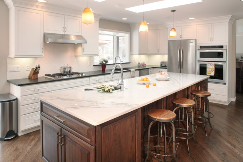 Example of a transitional kitchen design in Denver