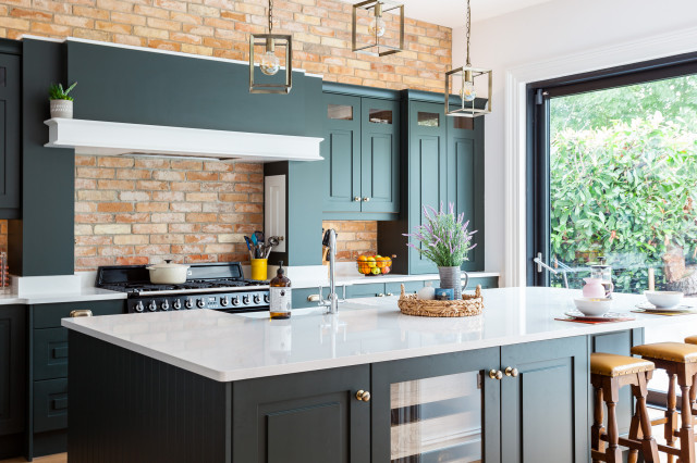 Dark Green Cabinets Add Elegance to a Welcoming Kitchen