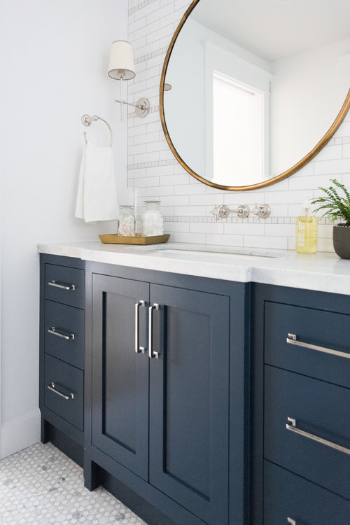 Photo of a mid-sized beach style bathroom in Salt Lake City with blue cabinets, a drop-in tub, a shower/bathtub combo, white walls, a console sink, white floor and a shower curtain.