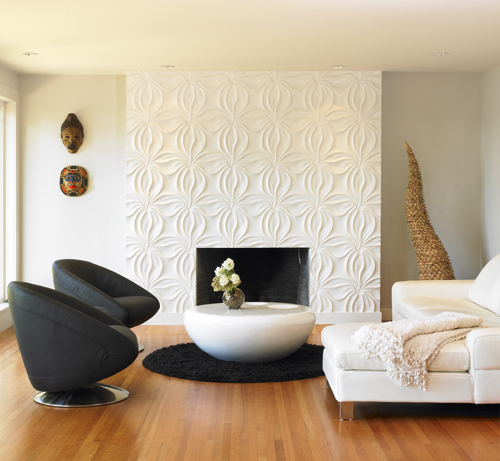 Modern living room in Vancouver with white walls and a standard fireplace.