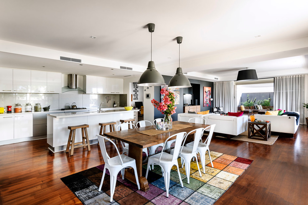 Photo of a contemporary open plan dining in Perth with white walls and dark hardwood floors.