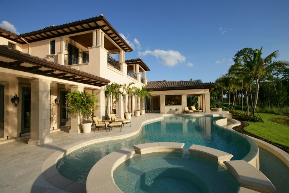 Inspiration for a large mediterranean custom-shaped pool in Miami.