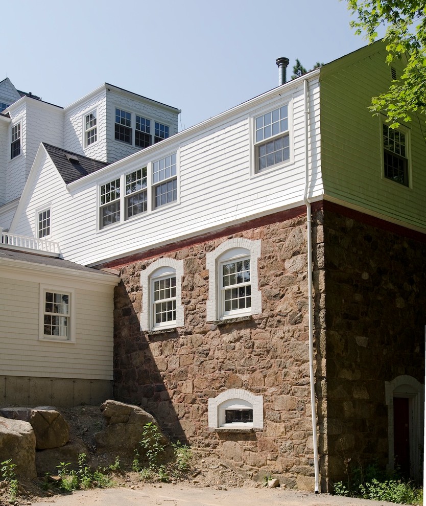 Inspiration for a large transitional three-storey white exterior in Boston with wood siding.