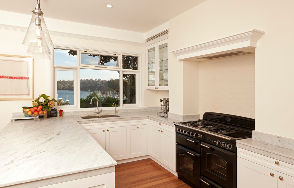 This is an example of a transitional kitchen in Sydney.