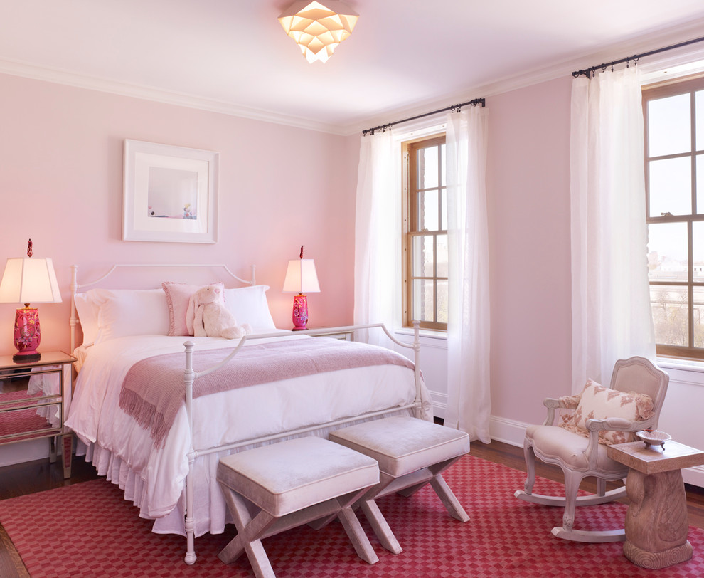 Inspiration for a transitional bedroom in New York with pink walls.