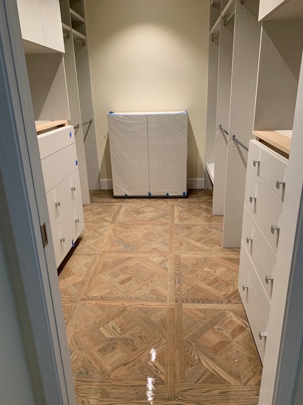 Modernized chevron and herringbone pattern with light taupe custom stain