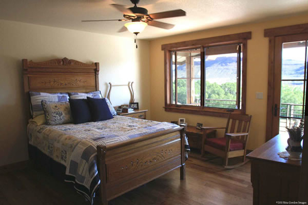 Bedroom - rustic bedroom idea in Denver