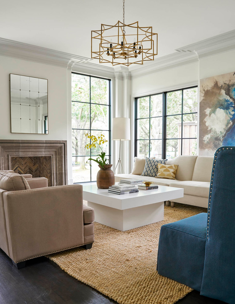 Transitional formal living room in Dallas with white walls, dark hardwood floors and a standard fireplace.