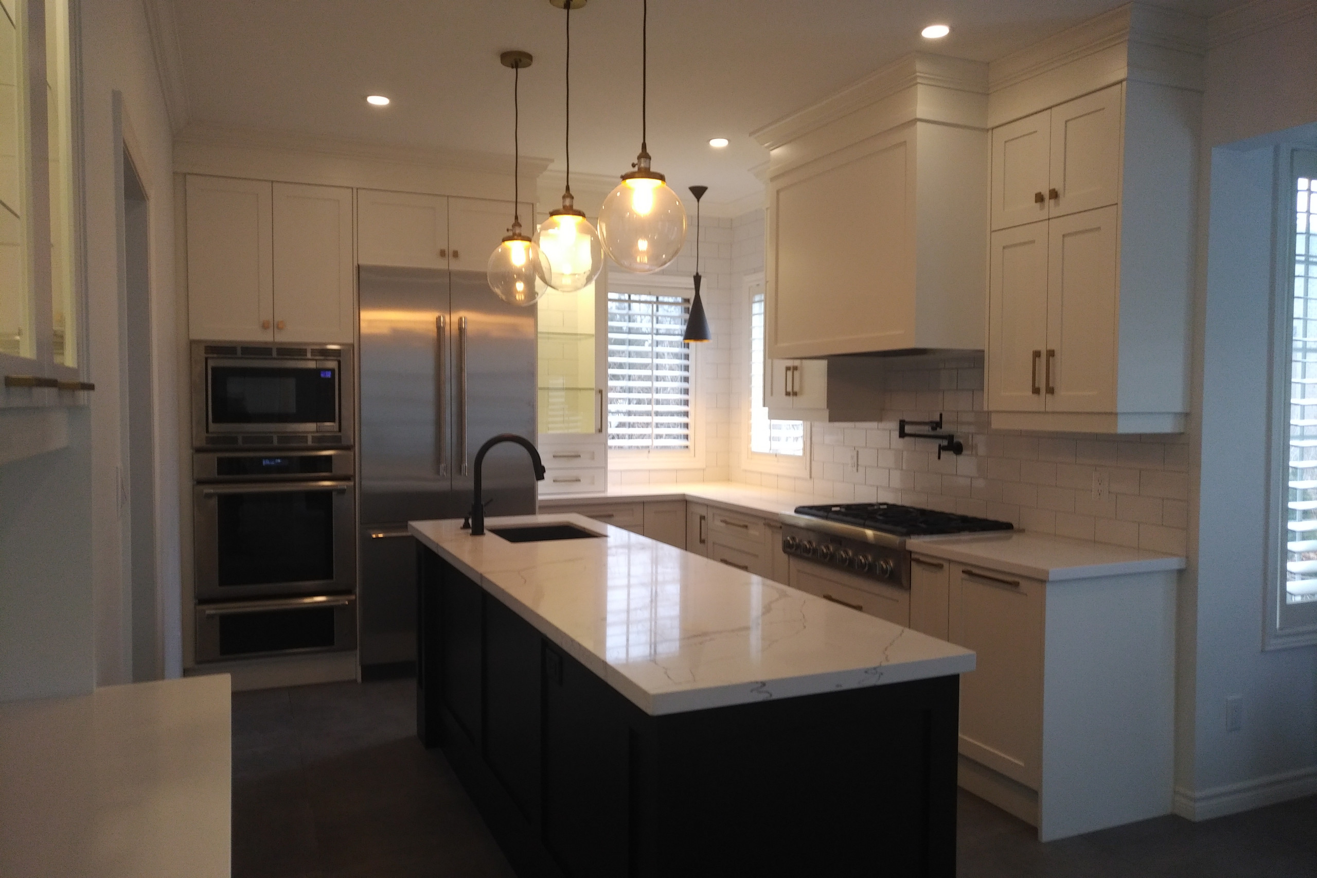 Full View White Kitchen with Brass Details