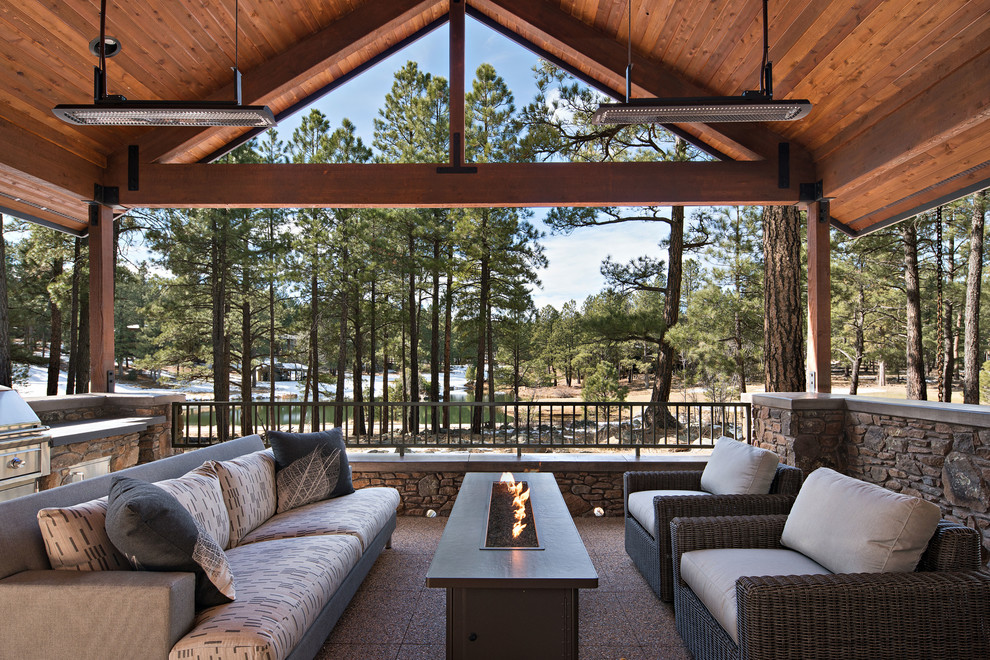 This is an example of a rustic porch design in Phoenix.