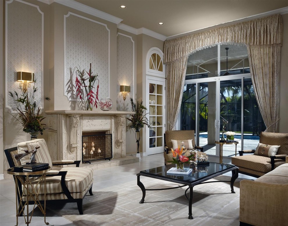 Traditional living room in Miami with beige walls and a standard fireplace.