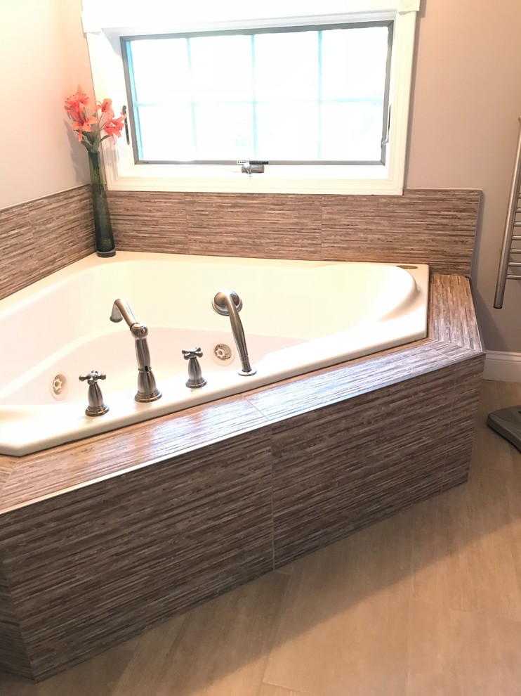 Example of a mid-sized transitional 3/4 brown tile and porcelain tile porcelain tile and beige floor corner bathtub design with beige walls