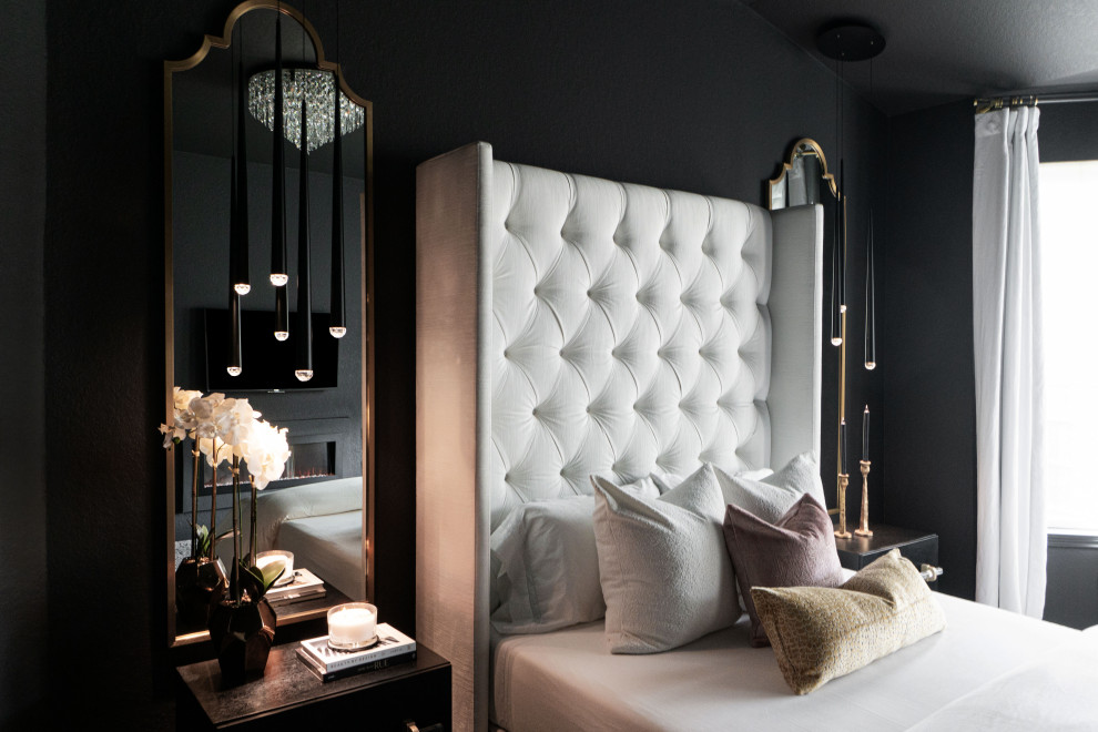 Inspiration for a medium sized contemporary master bedroom in Austin with black walls, carpet, a standard fireplace, beige floors and panelled walls.