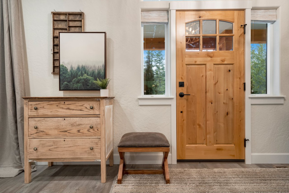 Entryway - rustic gray floor entryway idea