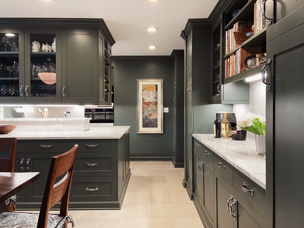 Enclosed kitchen - mid-sized transitional l-shaped marble floor and beige floor enclosed kitchen idea with an undermount sink, shaker cabinets, green cabinets, quartzite countertops, white backsplash, ceramic backsplash, stainless steel appliances, a peninsula and gray countertops