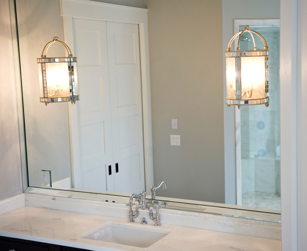 Drop-in bathtub - large transitional master gray tile gray floor drop-in bathtub idea with shaker cabinets, dark wood cabinets, gray walls, an undermount sink and a hinged shower door