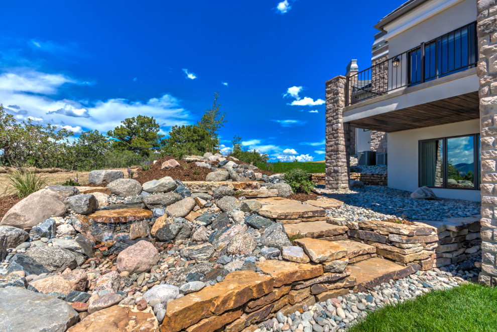 Transitional home design photo in Denver