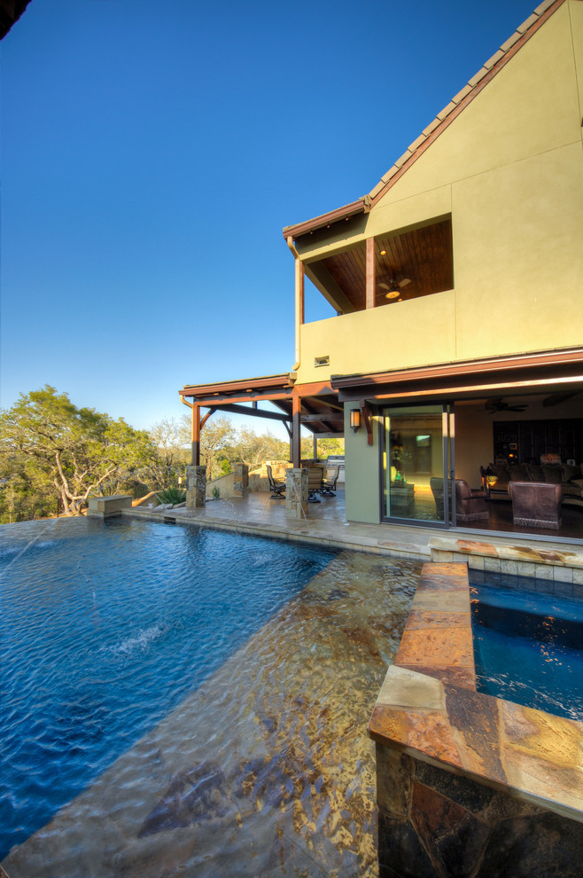 Mountain style pool photo in Austin