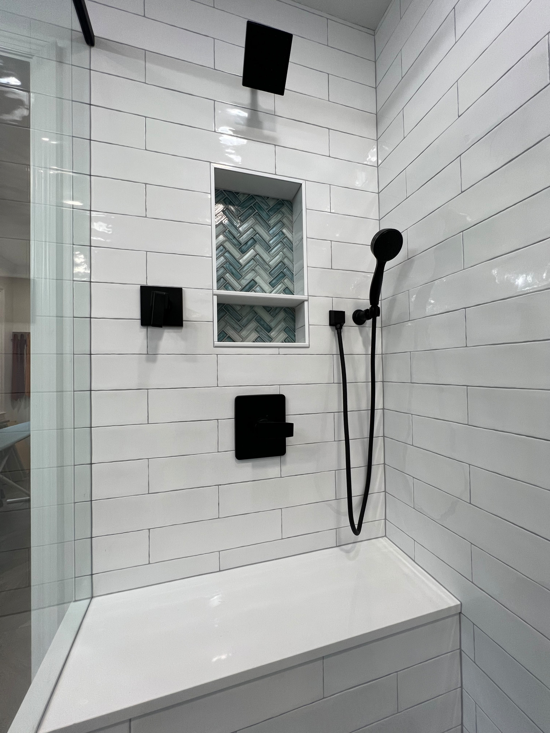 Walk in shower with custom stained vanity