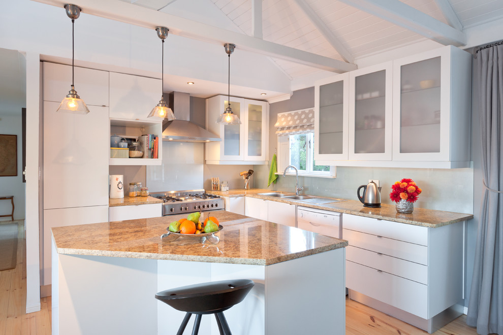 Inspiration for a mid-sized transitional l-shaped eat-in kitchen in Other with a double-bowl sink, flat-panel cabinets, white cabinets, granite benchtops, beige splashback, glass sheet splashback, stainless steel appliances, light hardwood floors, with island and yellow floor.