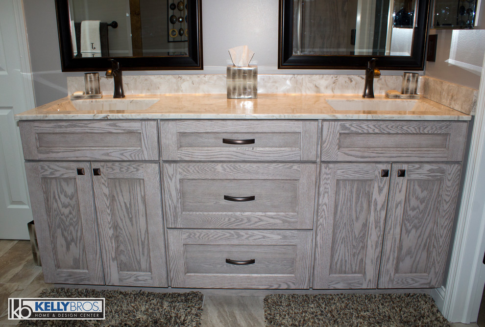 Inspiration for a transitional master ceramic tile bathroom remodel in Cincinnati with an integrated sink, shaker cabinets, gray cabinets and gray walls