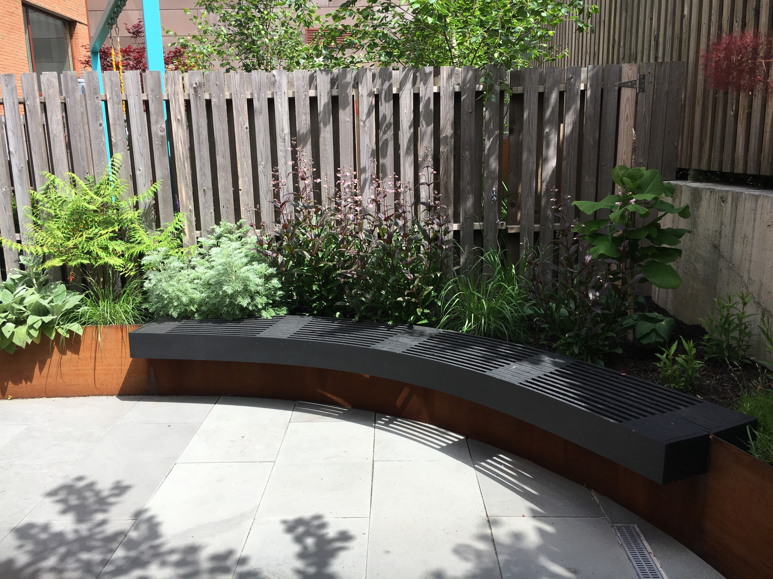 Modern Garden with Curved Corten Border