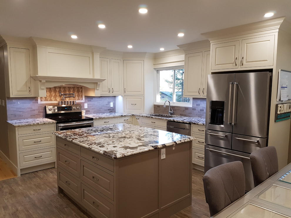 Inspiration for a mid-sized transitional u-shaped vinyl floor and gray floor eat-in kitchen remodel in Calgary with an undermount sink, beaded inset cabinets, white cabinets, gray backsplash, ceramic backsplash, stainless steel appliances, two islands, granite countertops and gray countertops